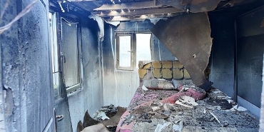 buyuksehirden-evi-yanan-vatandasa-yardim-eli.jpg
