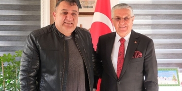 emekli-olan-personellerden-baskan-topalogluna-veda-ziyareti.jpg