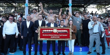 kurtdereli-yagli-gureslerinde-baspehlivan-mustafa-tas-oldu.jpg